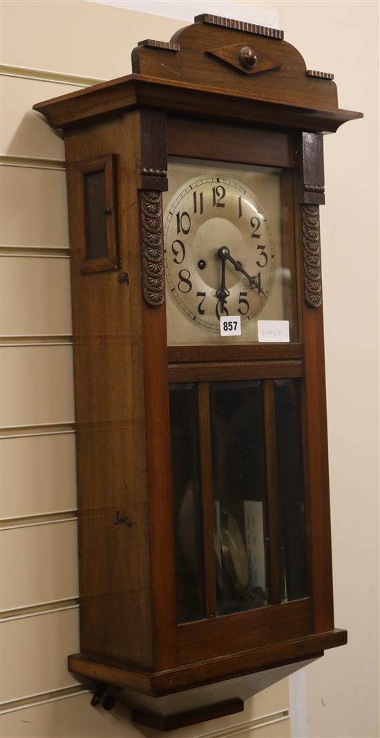 A 1920s mahogany 8 day hall clock W.36cm